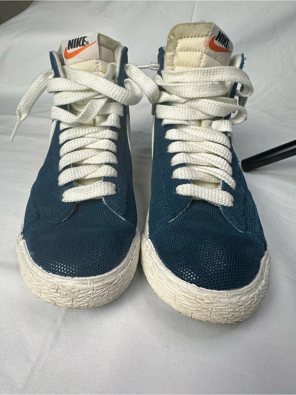 Nike Blue High-Top Sneakers with White Swoosh
